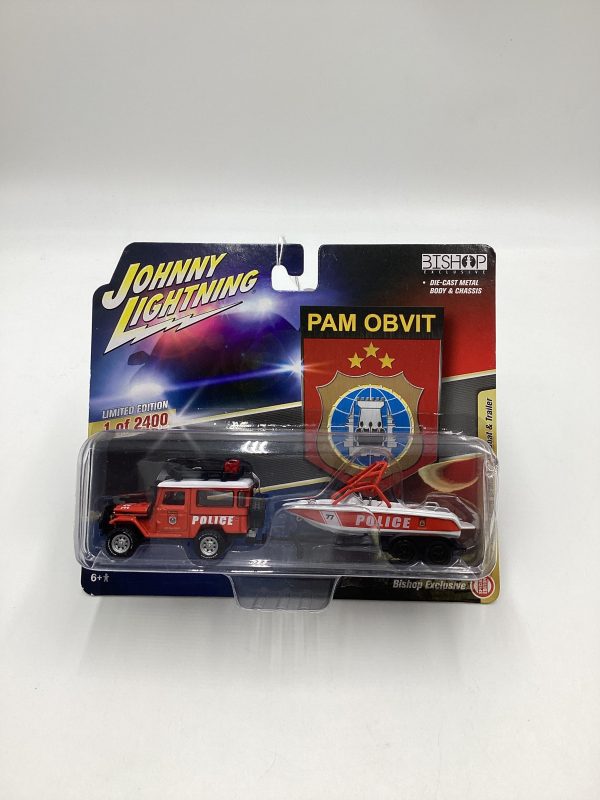 Johnny Lightning Bishop Exclusive Pam Obvit 1980 Toyota Land Cruiser w  Boat & Trailer For Sale